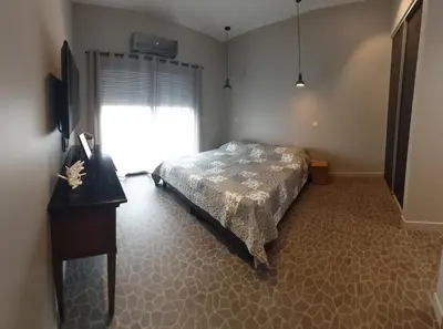 Un ou plusieurs lits dans un hébergement de l'établissement Bel appartement 140m2, terrasse au calme 20m2