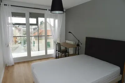 Un ou plusieurs lits dans un hébergement de l'établissement Appartement Venise 2 chambres