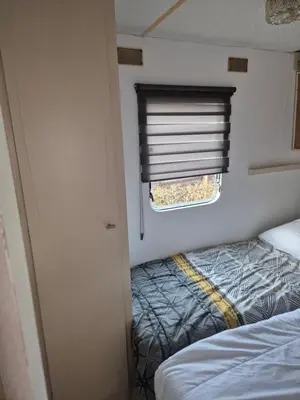 Un ou plusieurs lits dans un hébergement de l'établissement Mobil-Home N 17