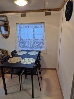 Coin salon dans l'établissement Mobil-Home N 17