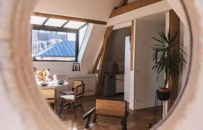 Coin salon dans l'établissement Appartement centre-ville Reims vue Cathédrale