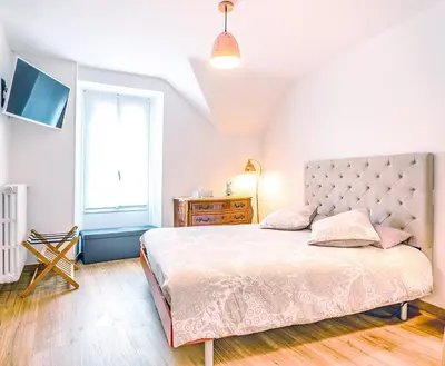 Un ou plusieurs lits dans un hébergement de l'établissement Suite Premium 4 étoiles, spacieux avec sauna et extérieur