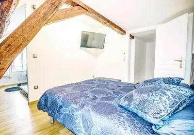 Un ou plusieurs lits dans un hébergement de l'établissement Suite Premium 4 étoiles, spacieux avec sauna et extérieur