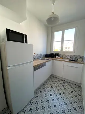 Cuisine ou kitchenette dans l'établissement Apart'Champagne Les Deux Ponts station & center