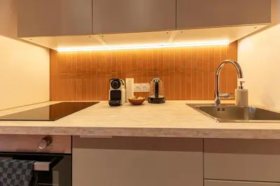 Cuisine ou kitchenette dans l'établissement Suite bien être - Sauna & Spa privatif - Baliroom Château Thierry
