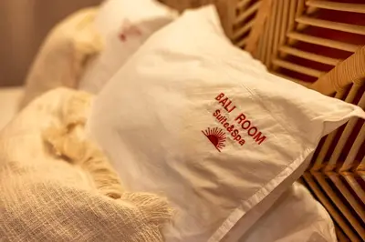 Un ou plusieurs lits dans un hébergement de l'établissement Suite bien être - Sauna & Spa privatif - Baliroom Château Thierry