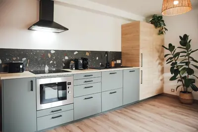 Cuisine ou kitchenette dans l'établissement Appartement haut de gamme - Epernay Centre - 3 étoiles