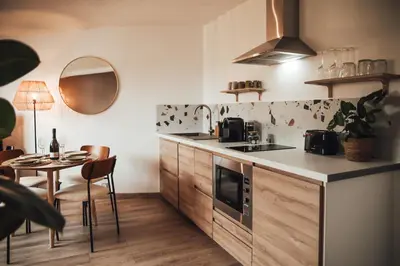 Cuisine ou kitchenette dans l'établissement Appartement haut de gamme - Epernay Centre - 3 étoiles