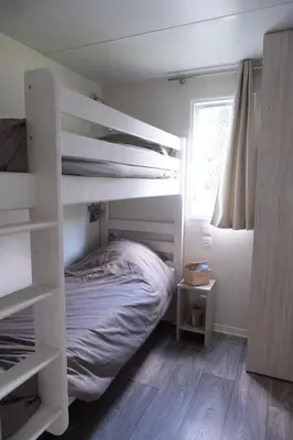 Un ou plusieurs lits dans un hébergement de l'établissement Mobil Home XXL 4 chambres - Camping Country Park