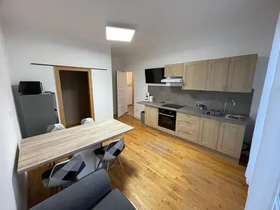 Cuisine ou kitchenette dans l'établissement Logement 1 à 5 personnes