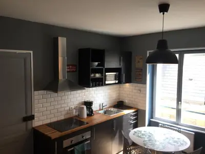 Cuisine ou kitchenette dans l'établissement Résidence Molière M4
