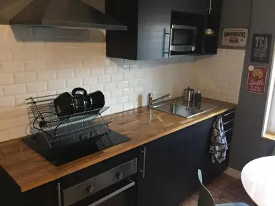 Cuisine ou kitchenette dans l'établissement Résidence Molière M4