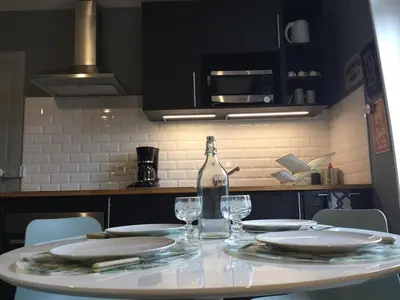 Cuisine ou kitchenette dans l'établissement Résidence Molière M3