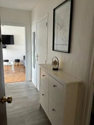 Télévision ou salle de divertissement dans l'établissement Appartement Châlons en champagne