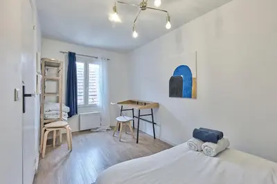 Un ou plusieurs lits dans un hébergement de l'établissement Château Saphir T2 hypercentre historique au pied du château
