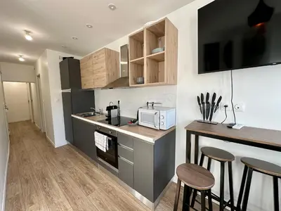 Cuisine ou kitchenette dans l'établissement Petra - Le confort à portée de main