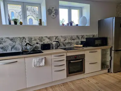 Cuisine ou kitchenette dans l'établissement La petite champêtre