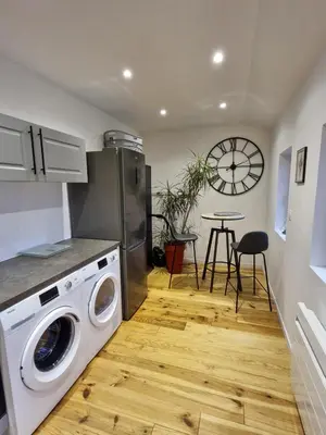 Cuisine ou kitchenette dans l'établissement La grange de l'Ailette