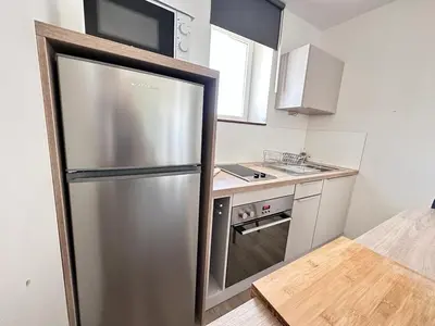 Cuisine ou kitchenette dans l'établissement Au nid du clos cocon a la campagne 10min de Reims