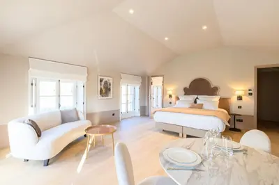 Un ou plusieurs lits dans un hébergement de l'établissement Les Suites BB, Champagne Besserat de Bellefon