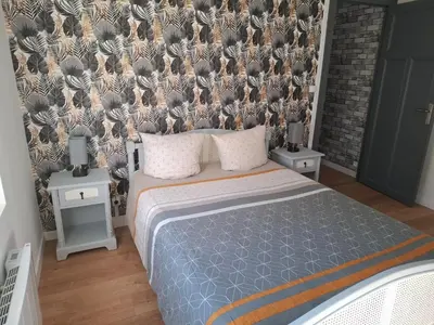 Un ou plusieurs lits dans un hébergement de l'établissement Appartement cosy