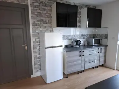 Cuisine ou kitchenette dans l'établissement Appartement cosy
