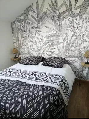 Un ou plusieurs lits dans un hébergement de l'établissement Quiet house near Disneyland