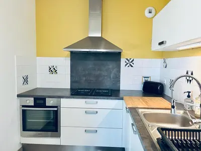 Cuisine ou kitchenette dans l'établissement charbonnier 6 personnes avec terrasse et parking