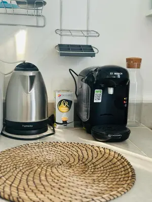 Cuisine ou kitchenette dans l'établissement Le studio des remparts