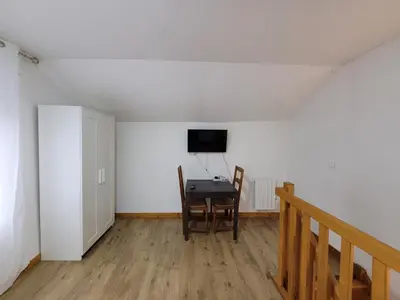 Télévision ou salle de divertissement dans l'établissement Duplex apartment 700 m from Compiègne train station