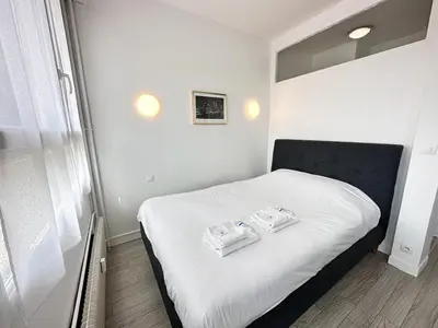 Un ou plusieurs lits dans un hébergement de l'établissement Un cocon paisible avec Balnéo proche centre ville