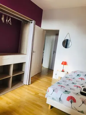 Un ou plusieurs lits dans un hébergement de l'établissement Neufchatel superbe appartement 3 chambres