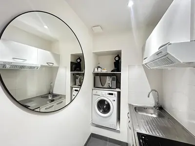 Cuisine ou kitchenette dans l'établissement Duruy G studio proche piscine et patinoire