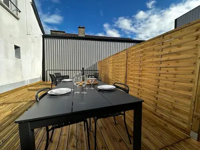 Balcon ou terrasse dans l'établissement E1 Reton magnifique T3 RDC terrasse et jacuzzi