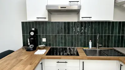 Cuisine ou kitchenette dans l'établissement Belin Cool terrasse et parking proche centre ville