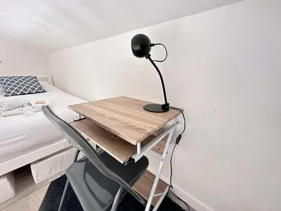 Un ou plusieurs lits dans un hébergement de l'établissement Le pilier un cocon en duplex proche centre ville