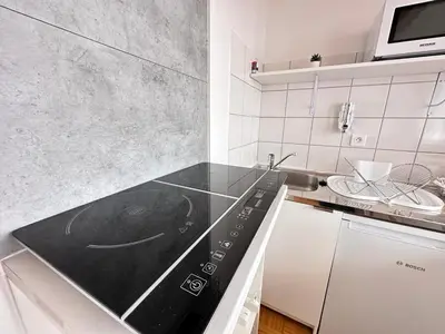 Cuisine ou kitchenette dans l'établissement Le pilier un cocon en duplex proche centre ville