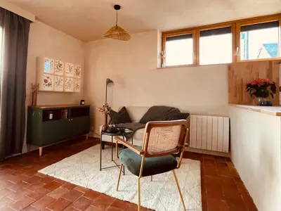 Coin salon dans l'établissement Évasion nature et bien-être - SPA - Petit Déjeuner
