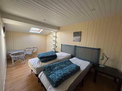 Un ou plusieurs lits dans un hébergement de l'établissement Loft entre vignes et lac