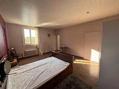 Un ou plusieurs lits dans un hébergement de l'établissement Loft entre vignes et lac