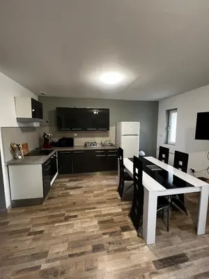 Cuisine ou kitchenette dans l'établissement Appartement avec terrasse