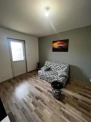 Coin salon dans l'établissement Appartement avec terrasse