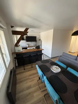 Coin salon dans l'établissement Appartement 2 chambres 6 couchages Witry les Reims