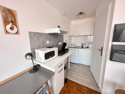 Cuisine ou kitchenette dans l'établissement La suite des 3 piliers studio avec parking privé