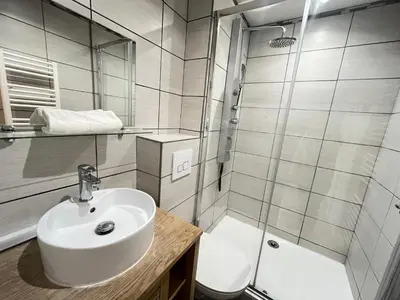 Salle de bains dans l'établissement Danton confortable chaleureux proche centre-ville