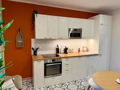 Cuisine ou kitchenette dans l'établissement L Écrin Rémois