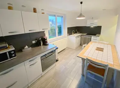 Cuisine ou kitchenette dans l'établissement Gite d'Inès