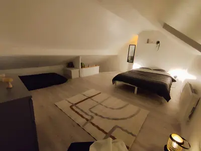 Un ou plusieurs lits dans un hébergement de l'établissement Maison au calme proche A4 Disney Petit déjeuner possible