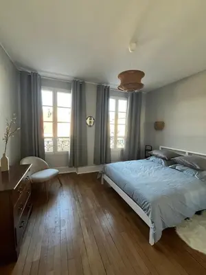 Un ou plusieurs lits dans un hébergement de l'établissement Appartement de la Diane