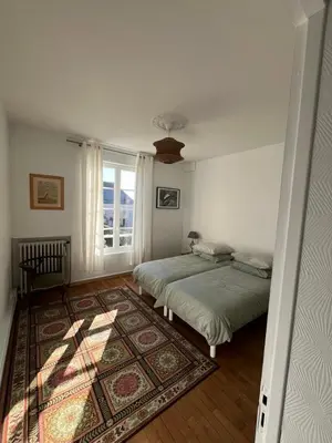 Un ou plusieurs lits dans un hébergement de l'établissement Appartement de la Diane